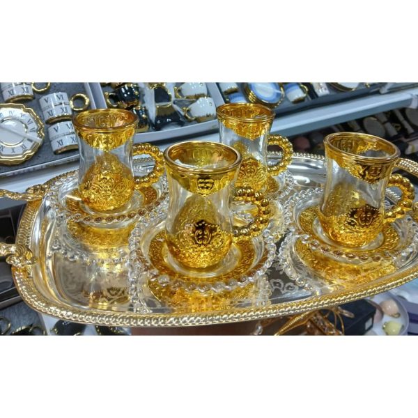 ⁦فناجين شاي مع أطباق⁩ - الصورة ⁦1⁩