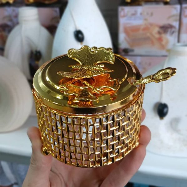 ⁦سكرية ذهبية مع ملعقة⁩ - الصورة ⁦1⁩